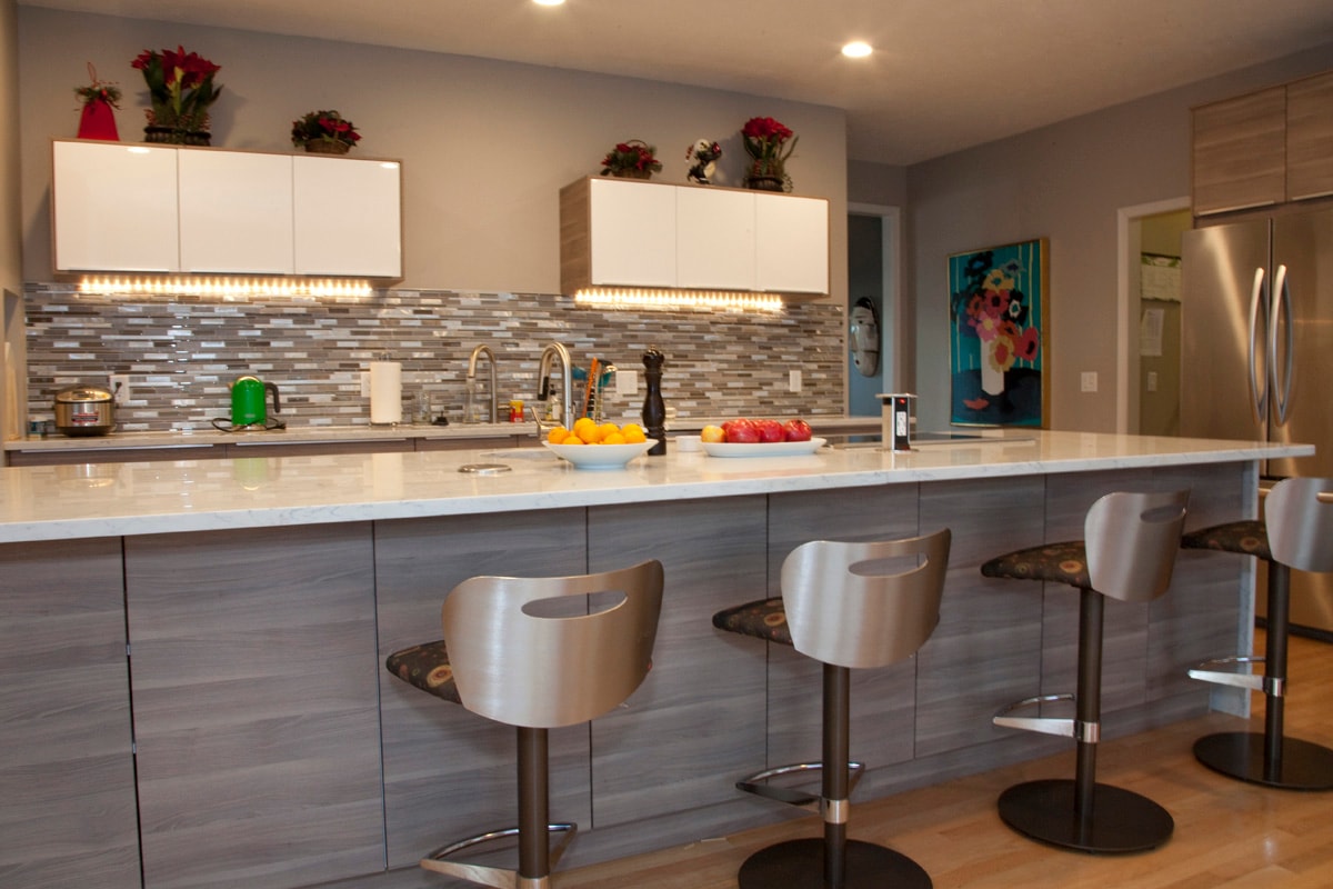Modern kitchen cabinet installation during remodel